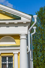 fragment of the facade of a historic building, a merchant's mansion in a Russian city