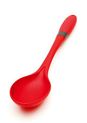 Red kitchen spoon or ladle on white
