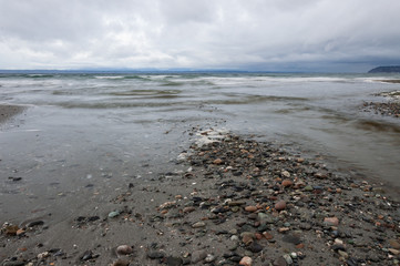 Long exposure shot of sea and stream at morning in Picnic Point area, WA, USA