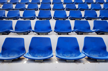 Naklejka premium Dirty blue stadium seats