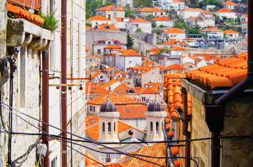 Romantic narrow alleys with historic and ancient buildings with medieval facades in old town of...