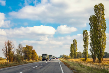 Obraz premium military vehicles on the highway