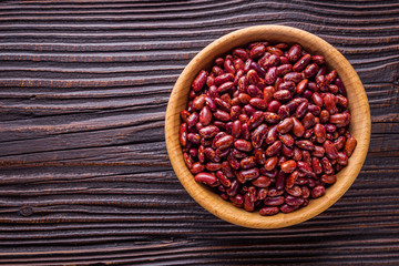 Fresh organic natural beans on wooden rustic background