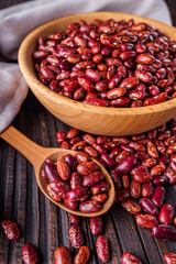 Fresh organic natural beans on wooden rustic background