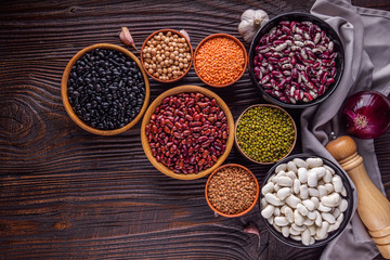 Fresh organic natural beans on wooden rustic background