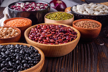 Fresh organic natural beans on wooden rustic background
