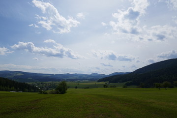 Beautiful landscape, mountains, fields and forest in Austria.