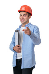 Joyful builder in helmet indicates at you, isolated