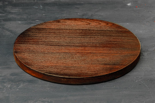 Circle Wooden Board On Stone Table Background