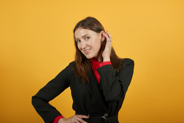 Young Attractive Brunette Woman In Black Stylish Suit, Red Shirt On Yellow Background, Cute Female...