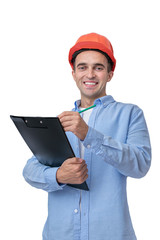 Builder in hardhat smiles and looks at the camera, man holding a notepad, takes notes, isolated background, vertical