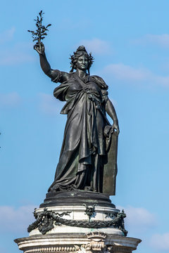 Paris, France - May 14, 2020: Marianne bronze statue, national symbol of the French Republic at Place de la Republique in Paris