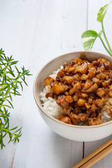 braised pork on rice is Minced pork served with pickles on top of steamed rice