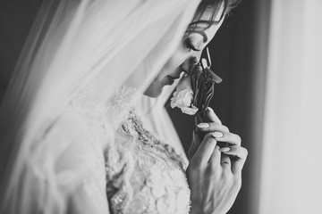 Luxury wedding bride, girl posing and smiling with bouquet