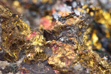 Gold. Yellow nugget. Golden background. Macro