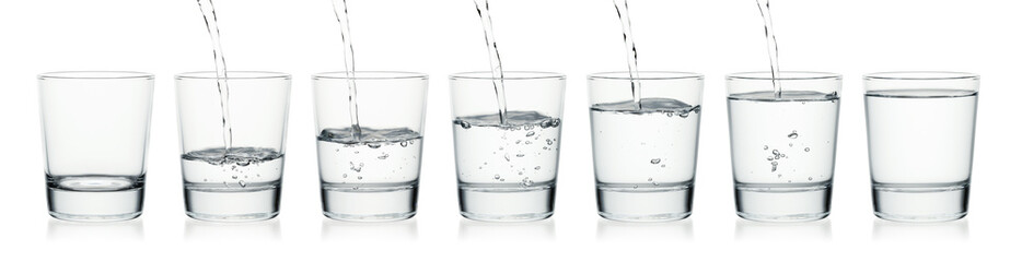 Panorama glasses. Empty, pouring water on a glass, full. Isolated on a white background.