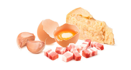 Ingredients for pasta carbonara sauce. Egg yolk, garlic, parmesan cheese and Italian bacon - obrazy, fototapety, plakaty