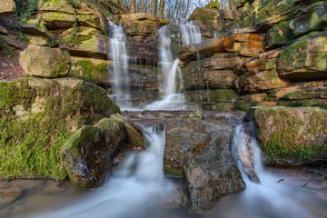 Fototapeta na wymiar Waterfalls in the gorge called Margarethenschlucht in the Odenwald near Neckargerach, Germany