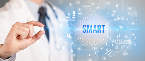 Doctor giving a pill with SMART inscription, new technology solution concept