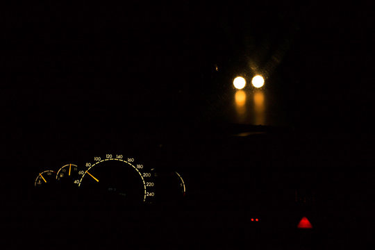 Dashboard illumination while night driving when a car come face, Driving at night with low speed