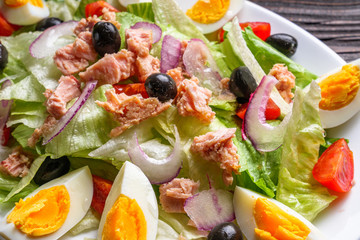 tuna salad on dark wooden rustic background