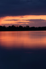 Colorful sunset by the Odra River, Germany.