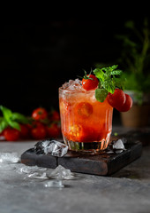 Ice tomato juice in a glass goblet.