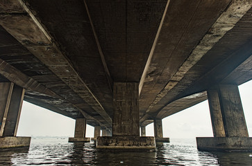 Underneath the Third Mainland Bridge which is one of the longest bridges in Africa