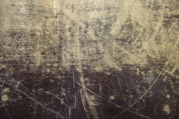 texture of the surface of the brass leaf, in scratches, background