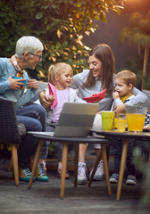 Happy generation family enjoying.Cheerful family spending good time.