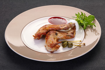 Roasted rabbit legs