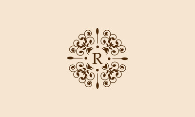 Vintage elegant floral monogram with ornament and letter R. The round business sign is identical for a restaurant, boutique, hotel, heraldry, jewelry, fashion.