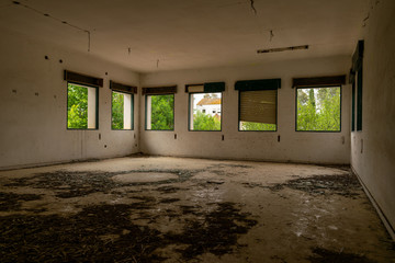 Abandoned room with broken glass