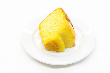 Closeup piece of sweet lemon cake served on white plate,Copy space.