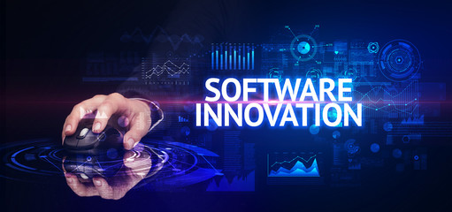 hand holding wireless peripheral with SOFTWARE INNOVATION inscription, modern technology concept