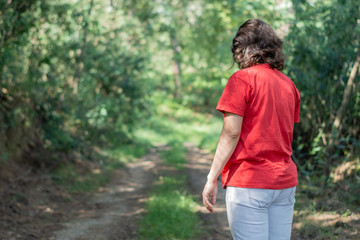 Woman strolling in lonely quiet, complete social isolation