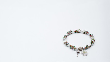 Catholic rosary bracelet with copy space