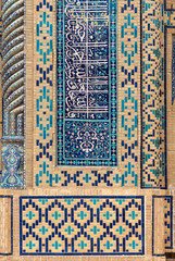 Close-up of mosaic wall with Islamic calligraphy at Ulugbek Medressa, Bukhara, Uzbekistan
