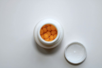 Top view on jar with vitamins