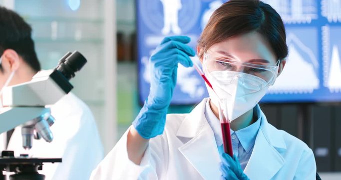 medical worker take test tube