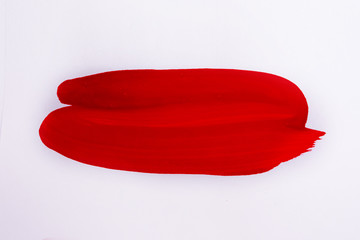 Painted with a brush, red stroke, horizontally, close up, copy space
