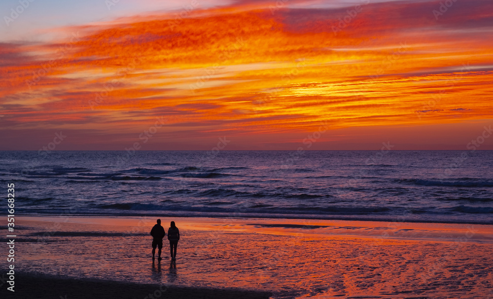 Wall mural sunset on the beach