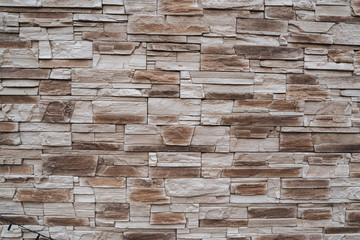 Wall with decorative stone trim. Background