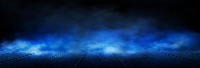 Wet asphalt, reflection of neon lights, a searchlight, smoke. Abstract light in a dark empty street with smoke, smog. Dark background scene of empty street, night view, night city.