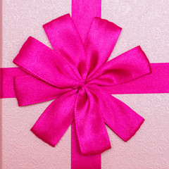 Gift with pink ribbon for Birthday, closeup, top view, 1:1