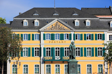 Monument of Ludwig van Beethoven - with the Old Post Office building in the background. Bonn, Germany.