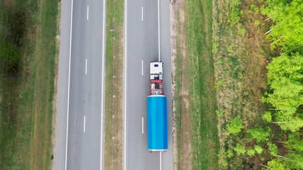 Transport Truck Carries A Large Cargo On The Highway Aerial Top View