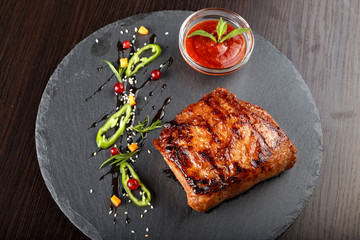 Steak on slate blackboard