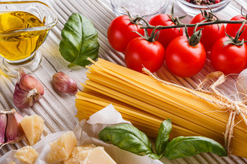 concept of traditional italian pasta with tomatoes and basil