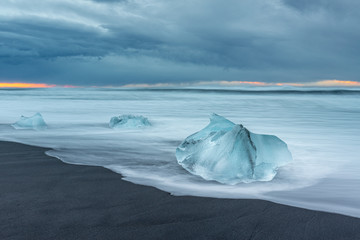 The famous Diamond beach in South Iceland. Giant ice gems on the black lava beach, placed near Jokulsarlon glacier lagoon.